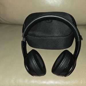 Black Beats Over-Ear Headphones with Case and Charging Cord.